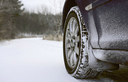 Car on Rural Road in Winter